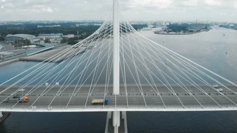 Parallel panning. The camera flies to a beautiful bridge with cars. Aerial shot Stock-Footage 93212910