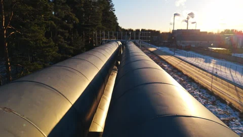 Parallel pipes near train tracks, Aerial view of parallel pipelines during Stock Footage 325411442
