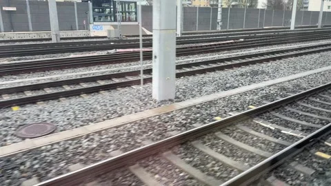 Parallel railway tracks at main station entrance Stock Footage 302379079