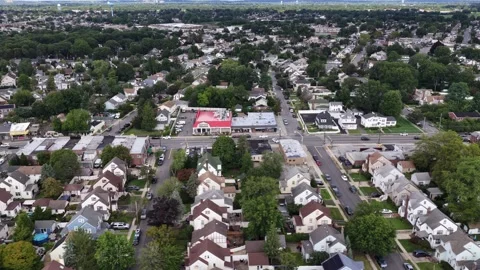 Parallel residential streets and leafy West Hempstead homes Stock Footage 344246100