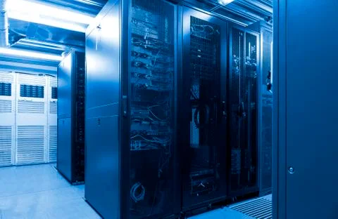 Parallel rows connected servers and internet cable infrastructure in big Stock Photos