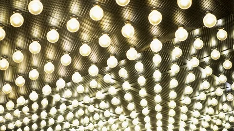 Parallel rows of glowing lamps. Abstract background. Edison vintage light bulbs 스톡 동영상 115657742