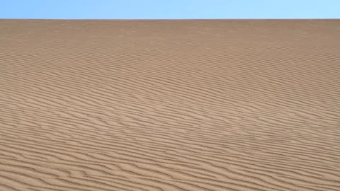 Parallel Sand Pattern Lines on Dune Surface in Desert Stock Footage 149430991
