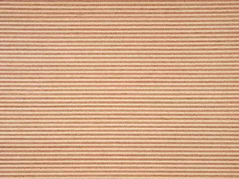 Parallel sandy brown and white lines offer a textured veneer pattern Stock Photos