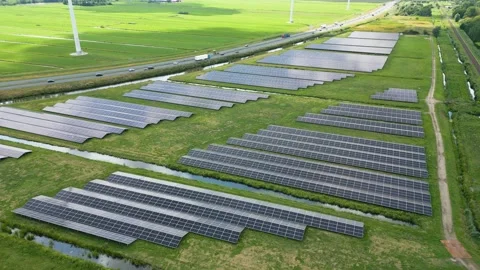 Parallel Solar Panel Rows – Drone Overflight in Alphen aan den Rijn Stock Footage 313921624