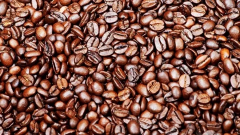 Parallel tracking, cross drive, lateral drive over a heap of coffee beans Video stock 142086009