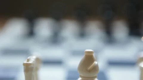 Parallel tracking dolly shot of chess pieces Stock Footage 20535600
