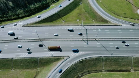 Parallel tracking. Multi-lane highway. The camera monitors the car. The box is Stock-Footage 93192776