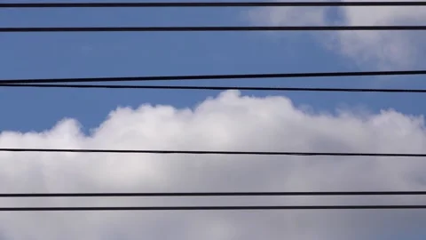 Parallel wires on the background of the cloudy sky. Stock-Footage 156591627