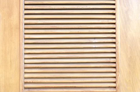 Parallel wooden slats texture. Wooden blinds, as an element of decor. Stock Photos