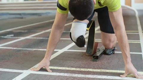 Paralympic Athlete starting From Blocks Stock Footage 62057347