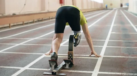 Paralympic Runner Starting a Race Stock Footage