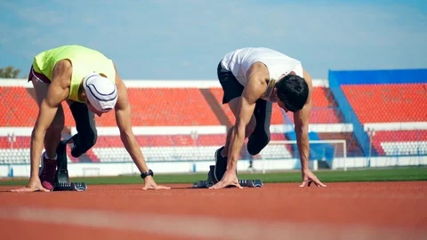 Paralympic runners start jogging at the stadium Stock-Footage 119090668