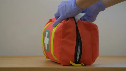 Paramedic is closing first aid kit Stock Footage 92939309