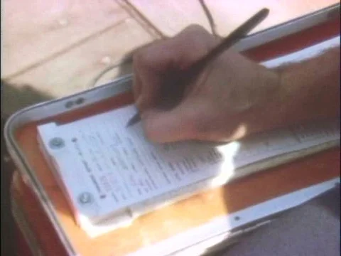 A paramedic communicates remotely with a doctor while administering CPR to a Stock Footage 74966864