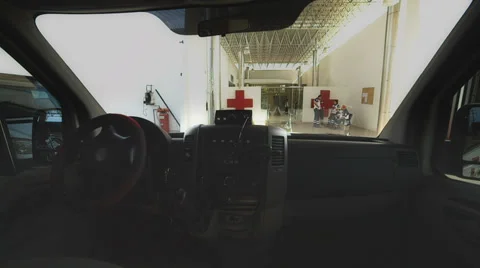 Paramedic drives the ambulance Stock Footage 34653597