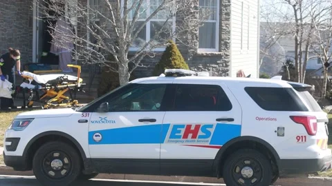 Paramedic Emergency Health Service EHS responding to an emergency incident Video stock 237976739