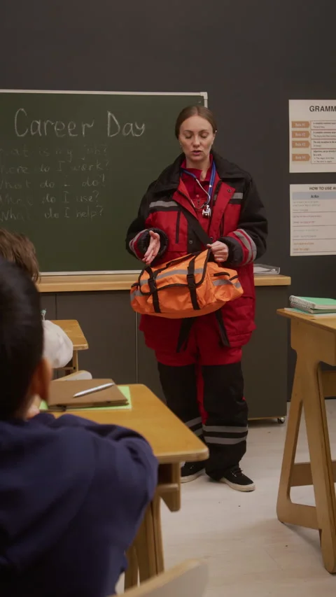 Paramedic as Guest Speaker in School Vertical Stock Footage 328328627