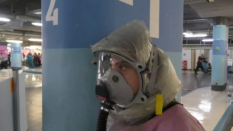 A paramedic has horror view in her eyes while expecting dead casualties Stock Footage 81419199