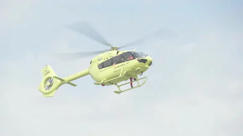 Paramedic helicopter pull up the cargo hook 4K Stock Footage 194501878