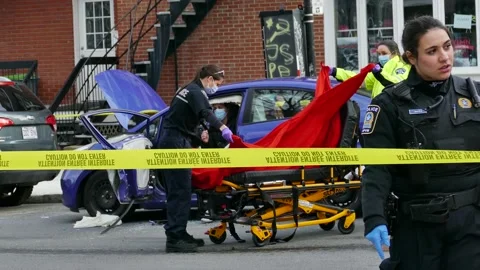 Paramedic preparing stretcher with red sheet Stock Footage 139654711