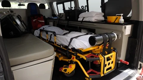 Paramedic Pulling Out Stretcher Stock Footage 116249368