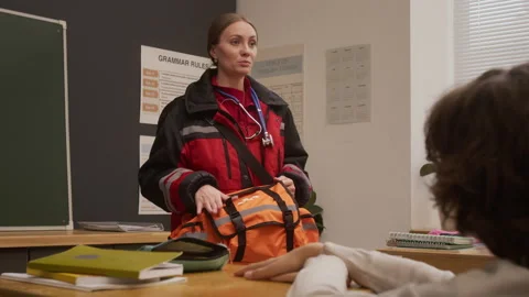 Paramedic Speaking in Class on Career Day Stock Footage 328323979