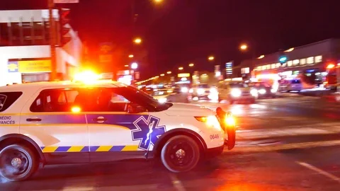 Paramedic supervisor with lights and sirens passing traffic to arrive on-scene Video stock 103132508