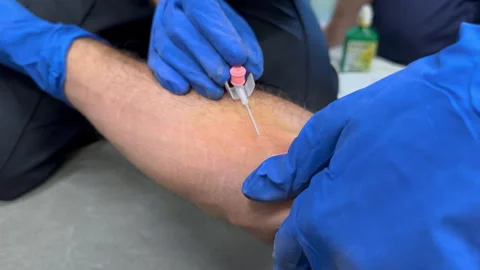 Paramedic Training IV Cannulation Into Forearm Vein In Gloved Hands Stock-Footage 341604648
