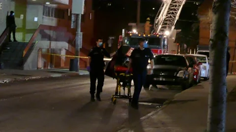 Paramedic walking with stretcher Stock Footage 139664414