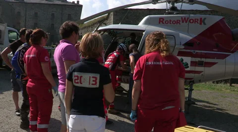 Paramedics beside an helicopter Stock Footage 33195968