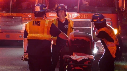 Paramedics chatting while on standby at scene of incident near Detroit Video stock 94861234