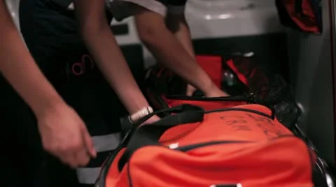 Paramedics check equipment Stock Footage 12695259