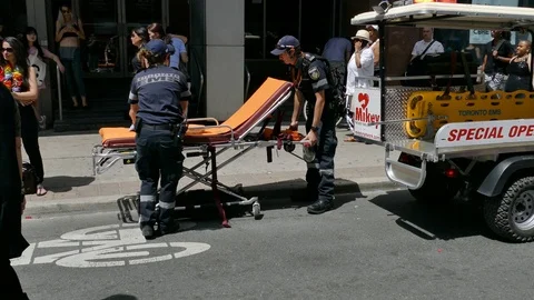Paramedics preparing stretcher with blanket during intervention Video stock 88417439