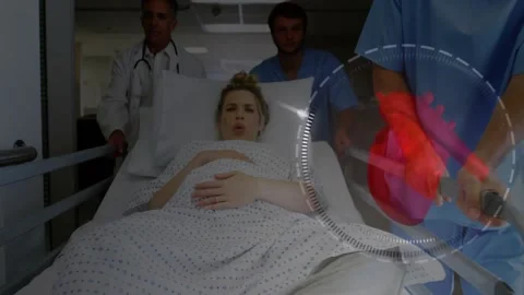 Paramedics pushing stretcher down corridor, activating medical heart scan Video stock 328151014