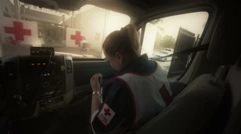 Paramedics receiving an emergency call Stock Footage 34653627