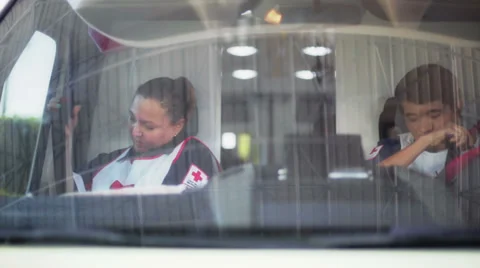 Paramedics receiving an emergency request Stock-Footage 34899447