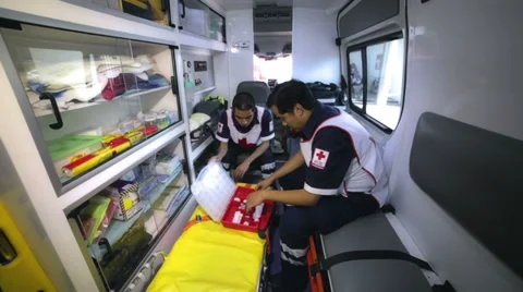Paramedics setting equipment Stock Footage 39217201