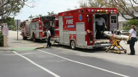 Paramedics unloading a gurney Stock Footage 705079