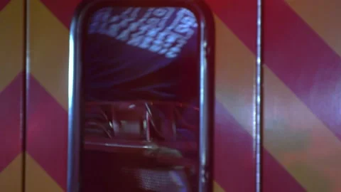 Paramedics working in back of ambulance 動画素材 203801541