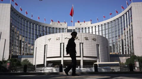 Paramilitary police walking in front of People's Bank of China Stock Footage 46571028