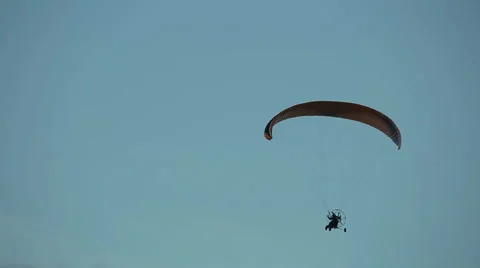 Paramotor flying in the air Stock Footage 53279590