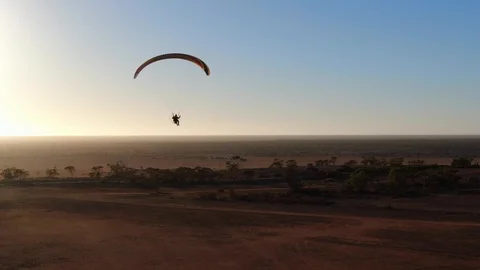 Paramotor flying at beautiful sunrise Video stock 116565939
