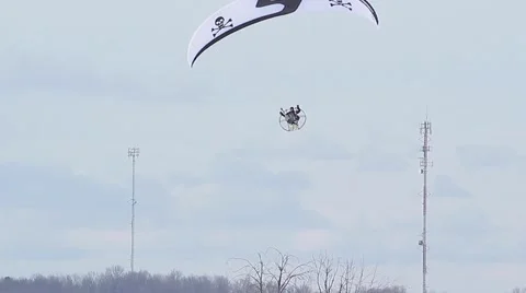 Paramotor flying in the sky Stock Footage 61151647
