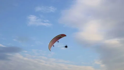 Paramotor flying in the sky Stock Footage 71311391