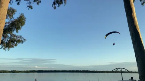 Paramotor &amp; Paragliding Flying on Top of Forest Stock-Footage 189555969