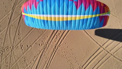 Paramotor Pilot Kiting Wing In Glamis Sand Dunes Stock Footage 165486031