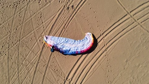 Paramotor Pilot Setting Up Wing Top Down Stock Footage 165485967