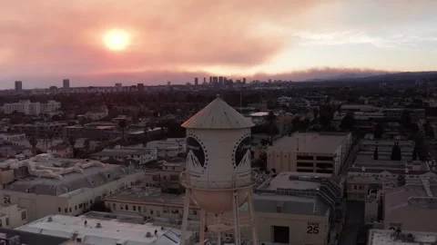 Paramount Studios with Smoke Haze and Red Sun in Hollywood during Los Angeles Stock Footage 302797582