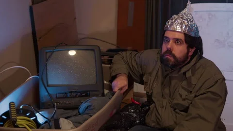 Paranoid guy with a tin foil hat Stock Footage 143171651